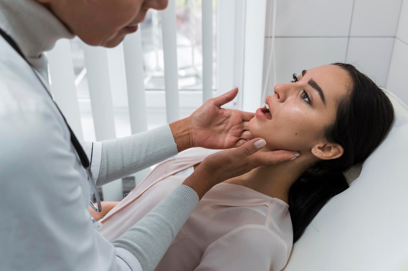 emergency-dental-care Dentist Checking Patient's Mouth